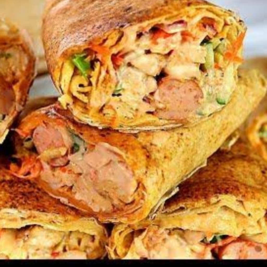 Chicken shawarma wrap with grilled chicken strips fresh vegetables and signature sauce from Yetty Pastries Canada
