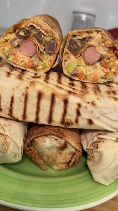 Creamy beef shawarma wrap with grilled beef strips vegetables and signature creamy sauce from Yetty Pastries Canada